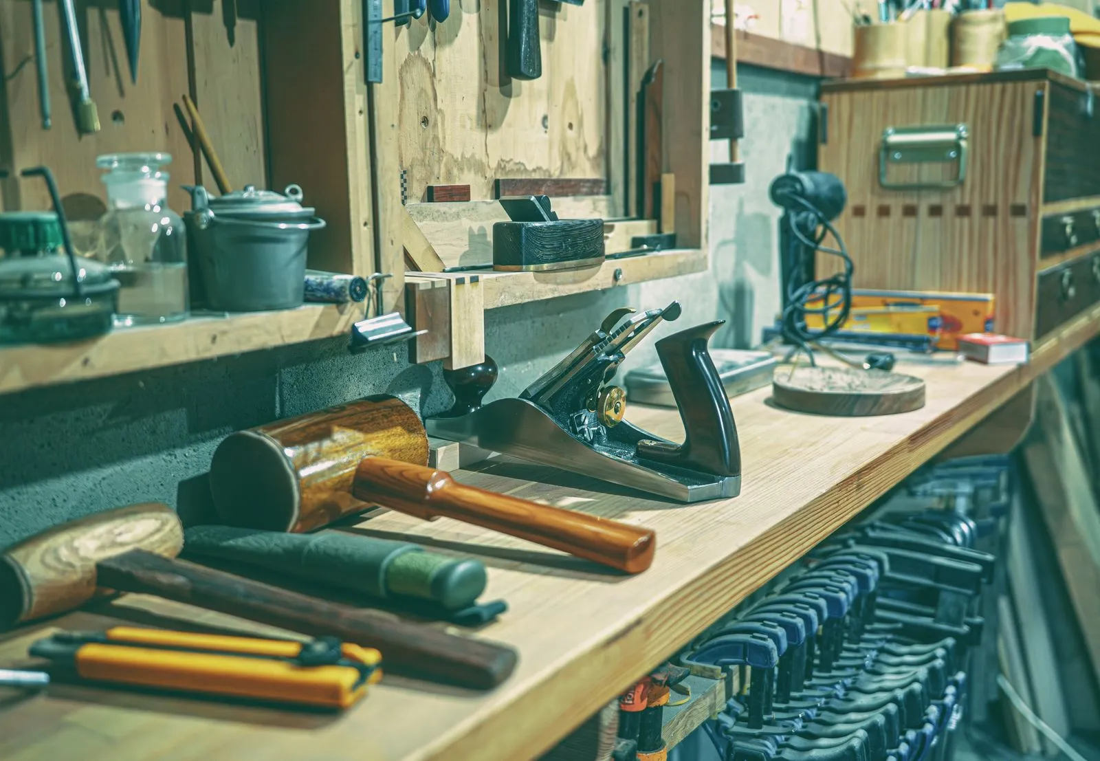 A tradesperson's workbench with tools laid out